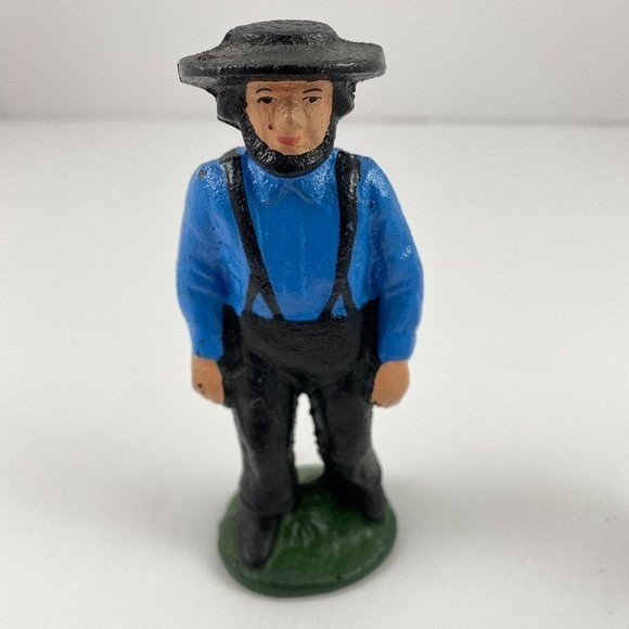 il_340x270.4067078686_traj.jpg Amish Man and Woman Heavy metal cast iron pair